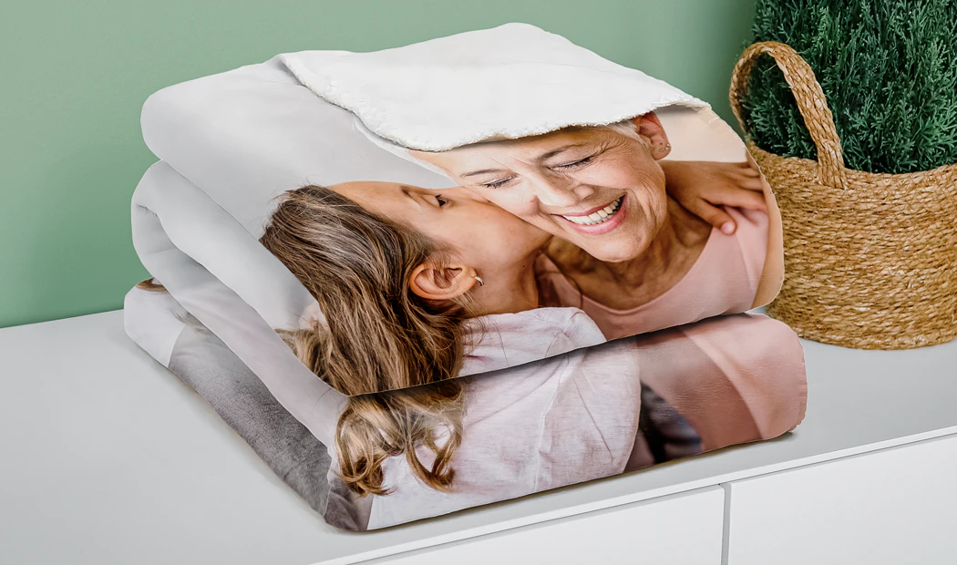 Large photo blanket on double bed with picture of girl photo