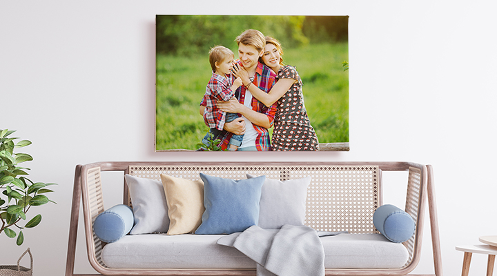 A canvas with a family in the countryside on it