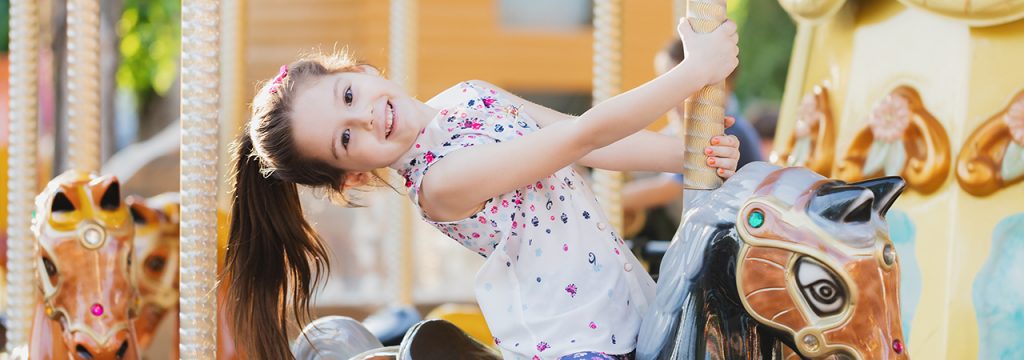 A girl on a merry-go-round 