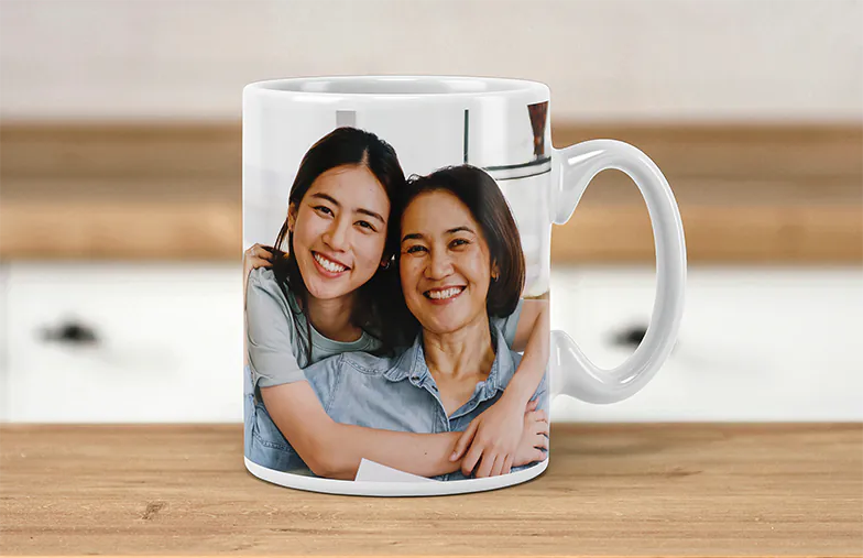 Mum and baby holding Printerpix cartoon design custom mug with dad text