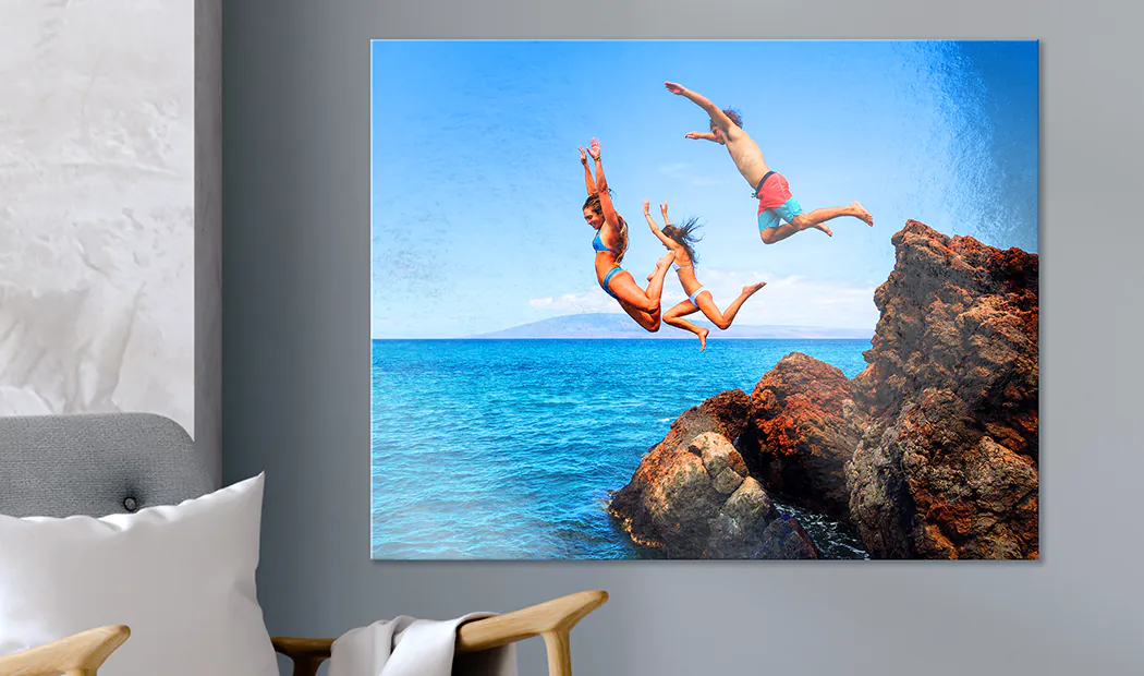 Four metal display panel photo prints with baby photos on