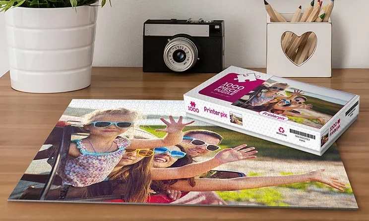 Pink cardboard puzzle of family