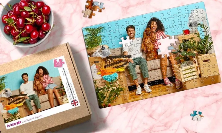 Pink cardboard puzzle of family
