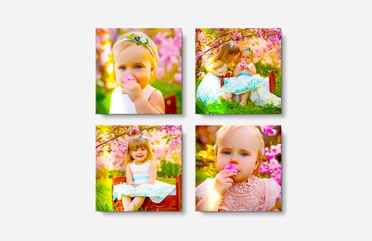 Four metal display panel photo prints with baby photos on