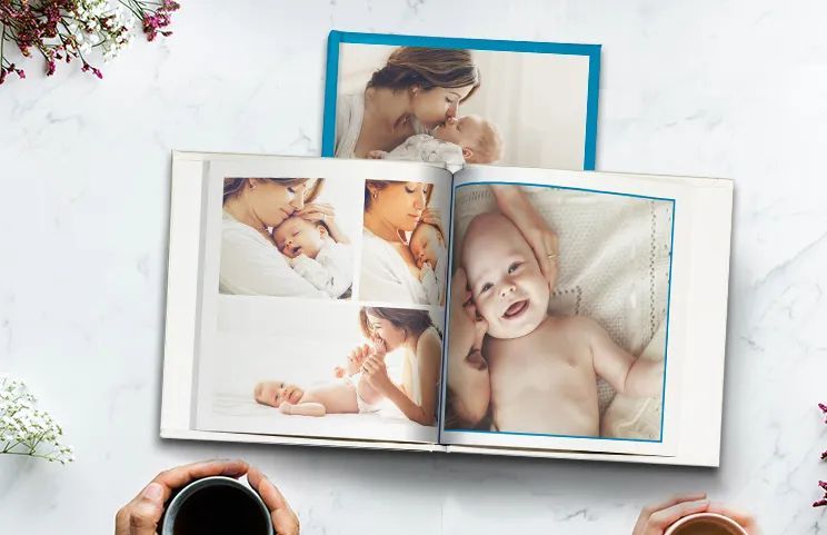 Custom printed Printerpix photo album with hard cover and large photos of old couple