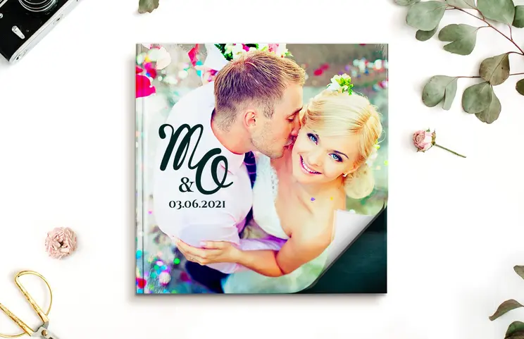 Custom printed Printerpix photo album with hard cover and large photos of old couple