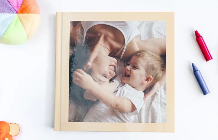 Personalised photo album book with romantic pictures of a couple and photo cover