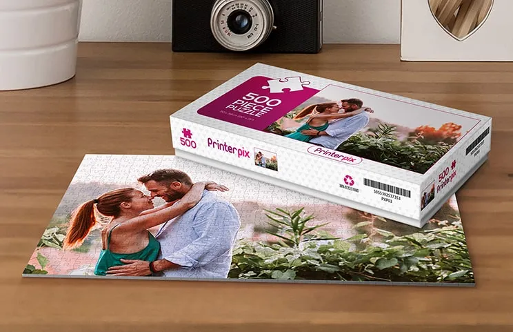 Cardboard puzzle of father and daughter on table
