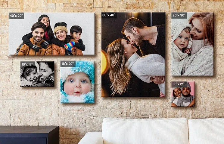Wall with 6 different sized, dimension labelled canvases of various family photos