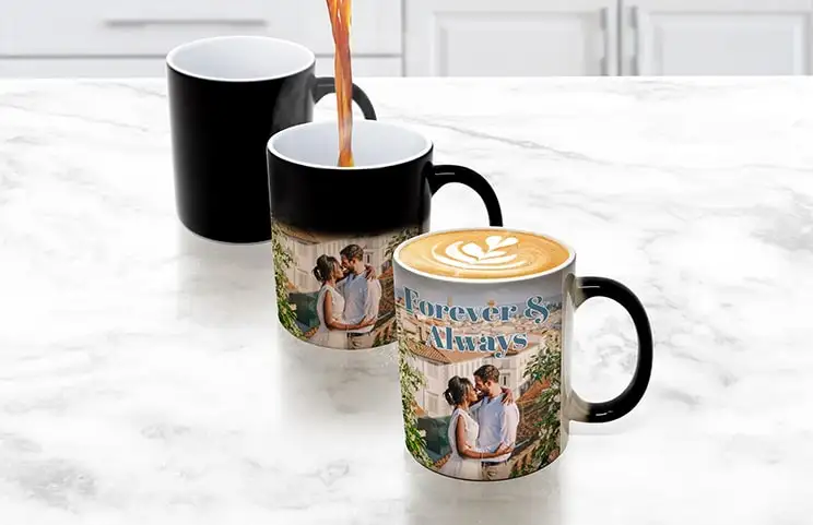 Tea from kettle pouring into magic mug