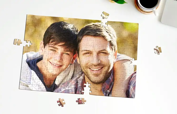 Father and son playing with puzzle