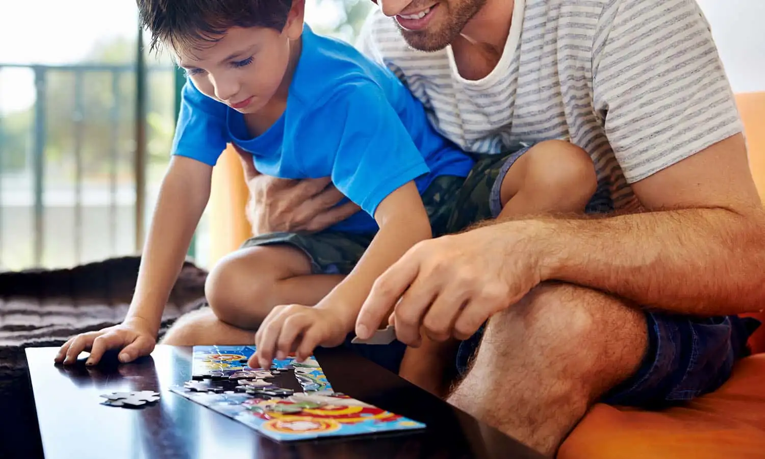 Close up of cardboard personalised puzzle with family photo
