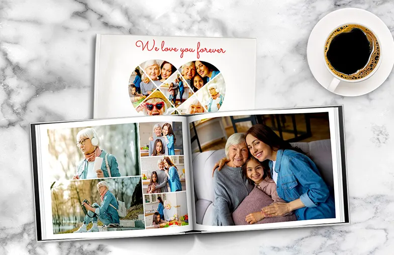 Two people looking at Printerpix custom photo book with wedding photos and bride