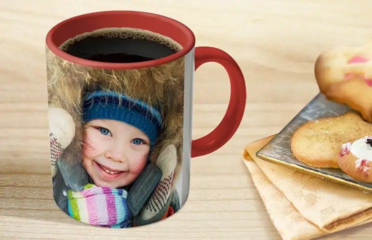 Coffee in red personalised photo mug with photo of young boy